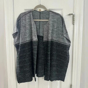 Mystree short sleeve Cardi.  Its got a loose fit and a great layering piece.